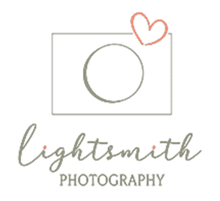 lightsmith photography logo - a camera with a heart for the flash